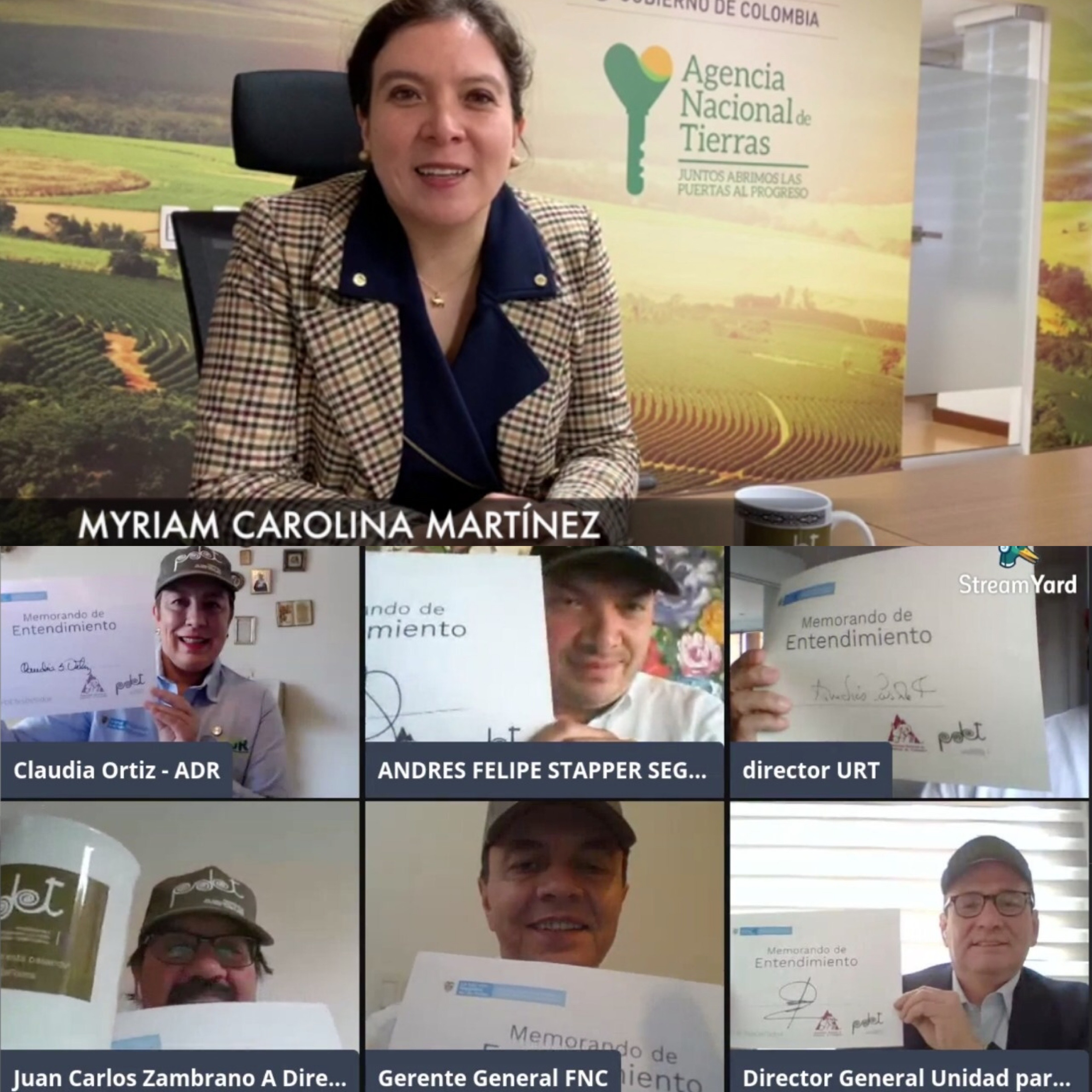 La Directora de la ANT, Myriam Martínez Cárdenas, aparece en video llamada con 6 funcionarios  de la Federación de Cafeteros, ellos mostrando cada uno el memorando de entendimiento. 